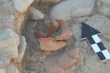 What it actually looked like as the amphora was being uncovered.