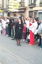 Not all the penitents wear hoods etc.  These women do penitence by wearing walking 8 or more hours in high heels etc.