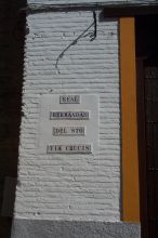 The name of the cofradia who let us in to see them putting their passo together.